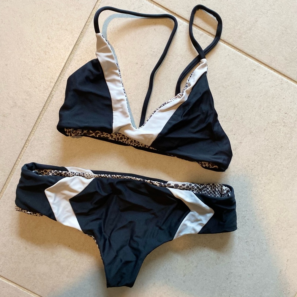 Older design acacia swimsuit in size small